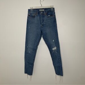 Levi’s medium wash high rise button fly wedgie skinny distressed jeans